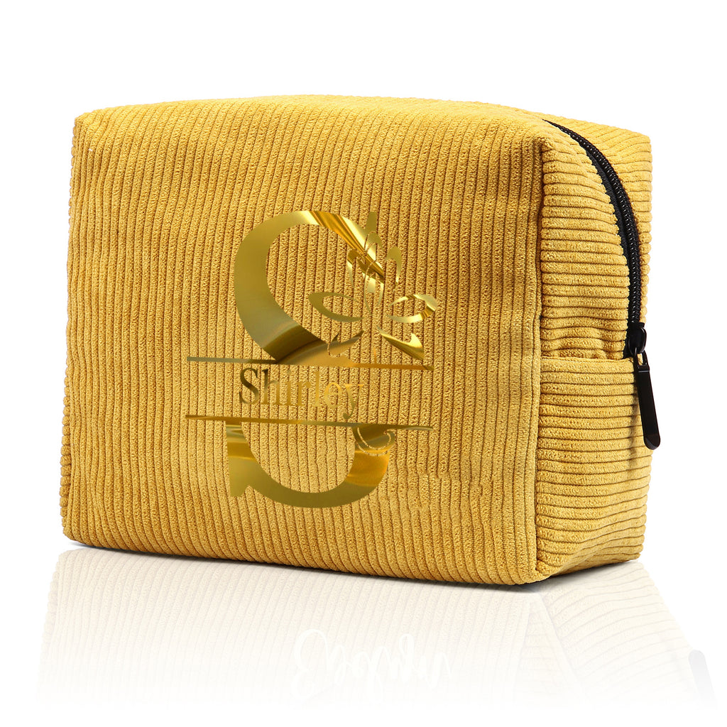 Corduroy name makeup bag for stylish organization. Perfect for storing cosmetics and everyday essentials.