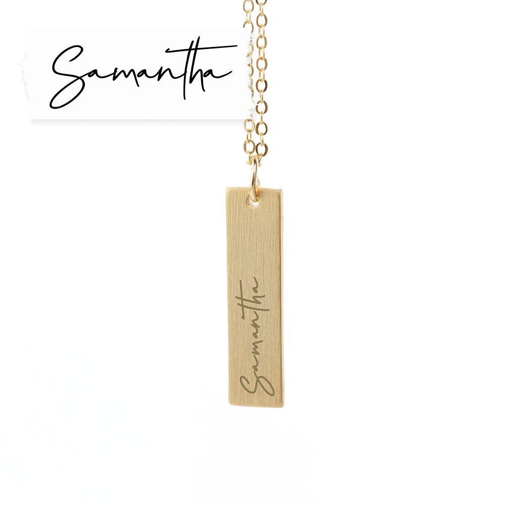 Gold bar pendant necklace engraved with a loved one's handwriting. A sentimental, stylish gift. Length: 3cm.